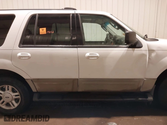 2003 Ford Expedition Special Service z VIN 1FMPU16L63LB50445, wystawiony jako IAAI lot #41445377 z przebiegiem 206 264 mil mil oraz . Historia ofert i sprzedaży dostępna na DreamBid. Obrazek 13.