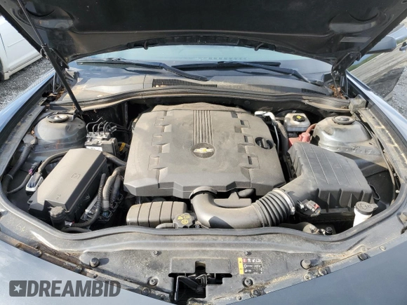 2015 Chevrolet Camaro LT z VIN 2G1FD1E34F9284313, wystawiony jako Copart lot #55575245 z przebiegiem 95 355 mil mil oraz Szkoda całkowita • Salvage title. Historia ofert i sprzedaży dostępna na DreamBid. Obrazek 11.