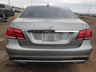 2014 Mercedes-Benz E 350 Sport with VIN WDDHF5KB2EA854735, listed as a Copart auction lot 88583415 with 99,456 mi miles and Salvage title. Bid and sale history available at DreamBid. Image 6.