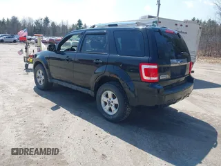 2011 Ford Escape Limited with VIN 1FMCU9EG5BKC33192, listed as a IAAI auction lot 42032152 with 160,745 mi miles. Bid and sale history available at carsss.com. Image 3.