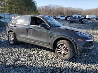 2016 Porsche Cayenne with VIN WP1AA2A21GKA38072, listed as a Copart auction lot 43082985 with 0 mi miles and Salvage Title. Bid and sale history available at carsss.com. Image 4.