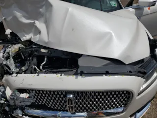 2017 Lincoln Continental Reserve with VIN 1LN6L9RP6H5628211, listed as a Copart auction lot 61369035 with Not provided miles and Salvage title. Bid and sale history available at DreamBid. Image 11.