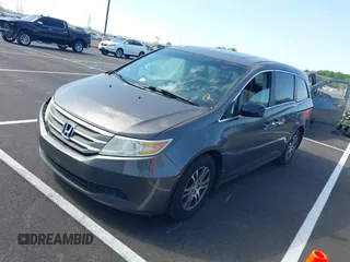 2011 Honda Odyssey EX-L with VIN 5FNRL5H62BB058765, listed as a IAAI auction lot 42017802 with 178,512 mi miles and . Bid and sale history available at carsss.com. Image 17.