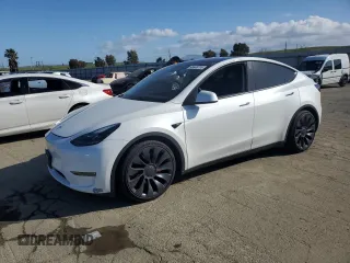 2021 Tesla Model Y Performance z VIN 5YJYGDEF6MF215621, wystawiony jako Copart lot #45400285 z przebiegiem 42 286 mil mil oraz Szkoda całkowita • Salvage title. Historia ofert i sprzedaży dostępna na DreamBid. Obrazek 1.