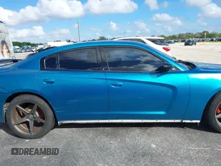 2012 Dodge Charger SXT with VIN 2C3CDXHG0CH185859, listed as a IAAI auction lot 40816799 with 132,572 mi miles. Bid and sale history available at carsss.com. Image 13.