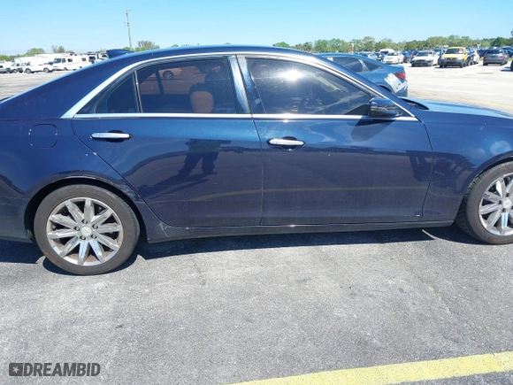 2016 Cadillac CTS Sedan RWD with VIN 1G6AP5SX8G0119984, listed as a IAAI auction lot 41679567 with 98,592 mi miles. Bid and sale history available at carsss.com. Image 6.