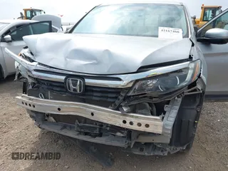2019 Honda Ridgeline RTL-E with VIN 5FPYK3F73KB006244, listed as a IAAI auction lot 42167460 with 53,498 mi miles and . Bid and sale history available at DreamBid. Image 6.
