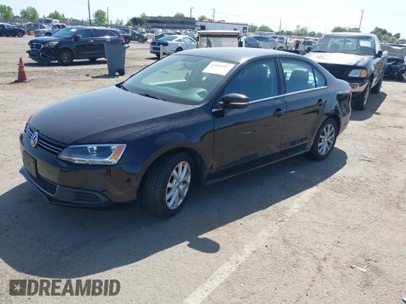 2014 Volkswagen Jetta Sedan SE w/Connectivity/Sunroof PZEV with VIN 3VWD17AJ8EM434456, listed as a IAAI auction lot 42099297 with 92,773 mi miles. Bid and sale history available at carsss.com. Image 2.