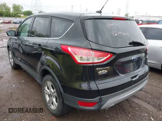 2015 Ford Escape SE with VIN 1FMCU9GX5FUB01864, listed as a IAAI auction lot 42199405 with 114,776 mi miles and . Bid and sale history available at DreamBid. Image 3.