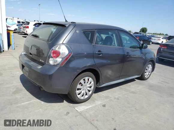 2009 Pontiac Vibe 1SB with VIN 5Y2SP67049Z458291, listed as a Copart auction lot 63234065 with 217,986 mi miles and Salvage title. Bid and sale history available at DreamBid. Image 3.