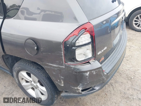 2016 Jeep Compass Latitude with VIN 1C4NJDEB4GD687300, listed as a IAAI auction lot 41800186 with 169,374 mi miles. Bid and sale history available at carsss.com. Image 18.