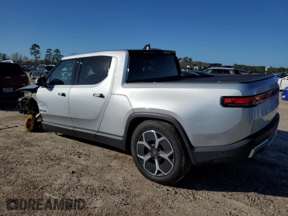 2023 Rivian R1T Adventure with VIN 7FCTGAAA3PN020577, listed as a Copart auction lot 84847414 with 7,888 mi miles and Salvage Title. Bid and sale history available at carsss.com. Image 2.
