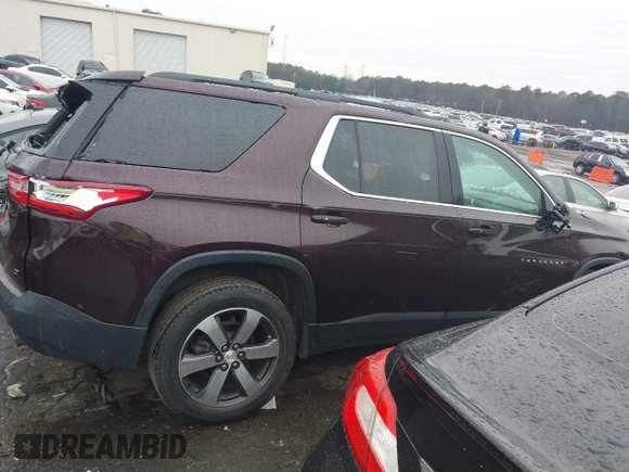 2019 Chevrolet Traverse LT z VIN 1GNERHKW8KJ117969, wystawiony jako IAAI lot #41619931 z przebiegiem 64 767 mil mil oraz . Historia ofert i sprzedaży dostępna na DreamBid. Obrazek 13.