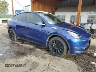 2020 Tesla Model Y Long Range z VIN 5YJYGDEE8LF029553, wystawiony jako Copart lot #51010665 z przebiegiem 42 877 mil mil oraz Szkoda całkowita • Salvage title. Historia ofert i sprzedaży dostępna na DreamBid. Obrazek 4.