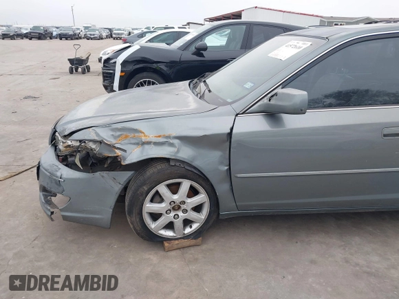 2002 Toyota Avalon XL with VIN 4T1BF28BX2U262186, listed as a IAAI auction lot 41572610 with 164,899 mi miles and . Bid and sale history available at DreamBid. Image 6.