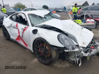 2018 Porsche 911 Carrera S z VIN WP0AB2A92JS124011, wystawiony jako IAAI lot #41892778 z przebiegiem 47 558 mil mil oraz . Historia ofert i sprzedaży dostępna na DreamBid. Obrazek 1.