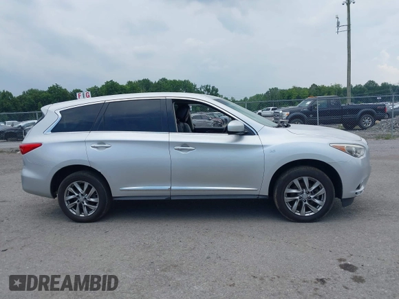 2014 Infiniti QX60 z VIN 5N1AL0MM2EC513700, wystawiony jako IAAI lot #42768421 z przebiegiem 145 171 mil mil oraz . Historia ofert i sprzedaży dostępna na DreamBid. Obrazek 13.