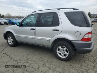 1999 Mercedes-Benz M 320/430/500 z VIN 4JGAB54E2XA142741, wystawiony jako Copart lot #45057045 z przebiegiem 72 285 mil mil oraz Szkoda całkowita • Salvage title. Historia ofert i sprzedaży dostępna na DreamBid. Obrazek 2.