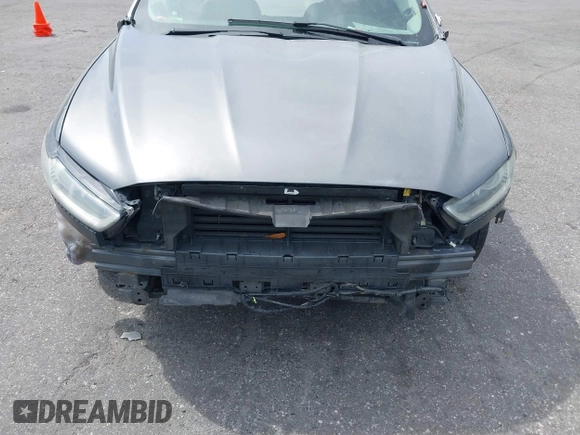 2013 Ford Fusion S with VIN 3FA6P0G74DR212341, listed as a IAAI auction lot 42076079 with 176,545 mi miles and . Bid and sale history available at DreamBid. Image 6.
