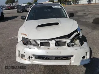 2014 Subaru WRX WRX с VIN JF1GR7E66EG221861, выставлен на аукционе Copart как лот 63117745 с пробегом 125 647 миль миль и Списание • Salvage title. История ставок и продаж доступна на DreamBid. Изображение 13.