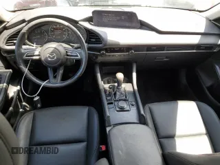 2023 Mazda 3 S Select with VIN 3MZBPABM7PM370974, listed as a Copart auction lot 61951505 with 58,845 mi miles and Salvage title. Bid and sale history available at DreamBid. Image 8.