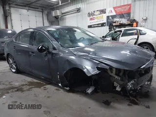 2021 Mazda 6 Carbon Edition with VIN JM1GL1WY5M1610808, listed as a IAAI auction lot 41567897 with 42,850 mi miles and . Bid and sale history available at DreamBid. Image 1.