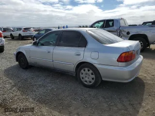 1999 Honda Civic EX with VIN 1HGEJ8649XL023265, listed as a Copart auction lot 53534445 with 265,017 mi miles and Clean Title. Bid and sale history available at carsss.com. Image 2.