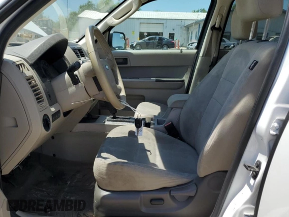 2012 Ford Escape XLT z VIN 1FMCU9DG3CKA09843, wystawiony jako Copart lot #63585395 z przebiegiem Nie podano mil oraz Szkoda całkowita • Salvage title. Historia ofert i sprzedaży dostępna na DreamBid. Obrazek 7.