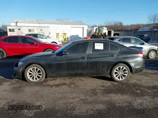 2018 BMW 3 Series 320i xDrive with VIN WBA8E5G57JNU47770, listed as a IAAI auction lot 41409122 with 62,198 mi miles. Bid and sale history available at carsss.com. Image 14.