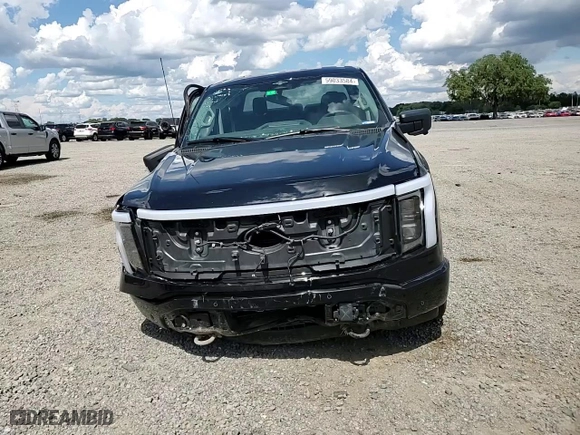 2023 Ford F-150 Lightning Pro with VIN 1FTVW1ELXPWG15885, listed as a Copart auction lot 59033584 with 8,851 mi miles and Salvage Title. Bid and sale history available at carsss.com. Image 10.