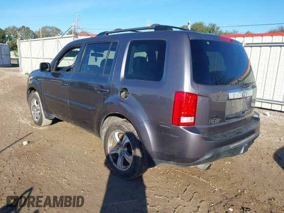 2015 Honda Pilot EX-L with VIN 5FNYF4H59FB060023, listed as a IAAI auction lot 41327793 with 197,981 mi miles and . Bid and sale history available at carsss.com. Image 3.