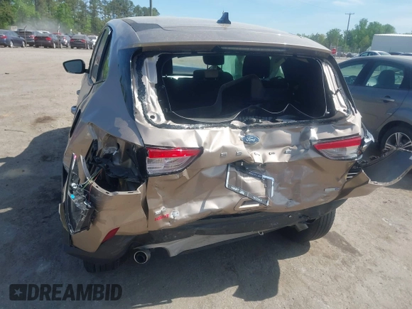 2020 Ford Escape SE with VIN 1FMCU9G6XLUA25108, listed as a IAAI auction lot 42106136 with 73,746 mi miles and . Bid and sale history available at DreamBid. Image 6.