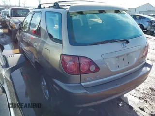 1999 Lexus RX 300 Luxury SUV with VIN JT6HF10U7X0054438, listed as a IAAI auction lot 41702361 with 1 mi miles. Bid and sale history available at carsss.com. Image 3.