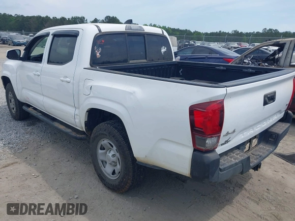2022 Toyota Tacoma SR with VIN 3TYCZ5AN9NT098903, listed as a IAAI auction lot 42088505 with 93,000 mi miles and . Bid and sale history available at DreamBid. Image 3.