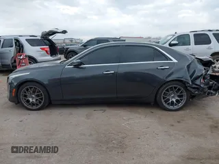 2014 Cadillac CTS Vsport Premium RWD z VIN 1G6AV5S8XE0175517, wystawiony jako IAAI lot #41126885 z przebiegiem 140 667 mil mil oraz . Historia ofert i sprzedaży dostępna na DreamBid. Obrazek 14.