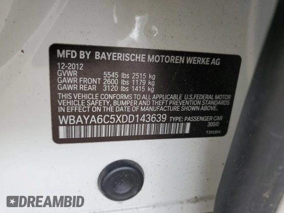 2013 BMW 7 Series 740i with VIN WBAYA6C5XDD143639, listed as a Copart auction lot 62296694 with 97,082 mi miles and Salvage Title. Bid and sale history available at carsss.com. Image 12.