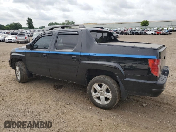 2010 Honda Ridgeline RTL with VIN 5FPYK1F5XAB014004, listed as a Copart auction lot 62848595 with 131,920 mi miles and Clean title. Bid and sale history available at DreamBid. Image 2.