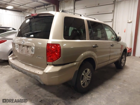 2004 Honda Pilot EX with VIN 2HKYF18464H567384, listed as a IAAI auction lot 41790773 with 142,534 mi miles. Bid and sale history available at carsss.com. Image 4.