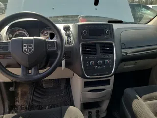 2014 Dodge Grand Caravan American Value with VIN 2C4RDGBGXER413961, listed as a Copart auction lot 54748405 with 146,589 mi miles and Clean Title. Bid and sale history available at DreamBid. Image 9.
