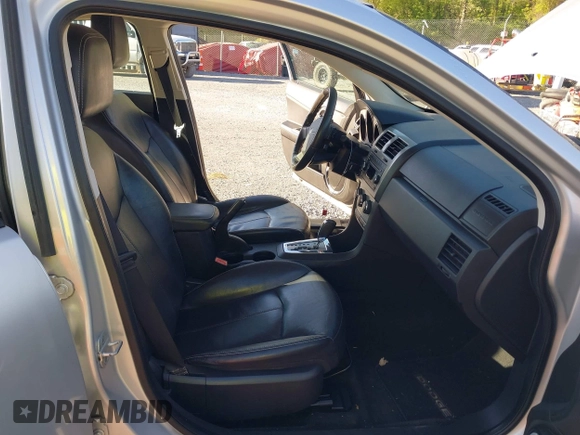 2010 Dodge Avenger R/T with VIN 1B3CC5FB2AN234415, listed as a IAAI auction lot 42123386 with 145,560 mi miles and . Bid and sale history available at DreamBid. Image 5.