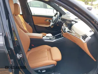 2023 BMW 3 Series 330i with VIN 3MW69FF09P8D39007, listed as a IAAI auction lot 42071643 with 24,781 mi miles and . Bid and sale history available at DreamBid. Image 5.