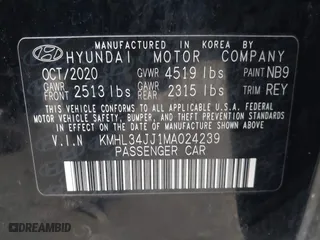 2021 Hyundai Sonata Hybrid SEL with VIN KMHL34JJ1MA024239, listed as a IAAI auction lot 41707290 with 165,214 mi miles. Bid and sale history available at carsss.com. Image 9.