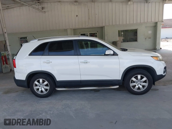 2013 Kia Sorento LX with VIN 5XYKT3A69DG370190, listed as a IAAI auction lot 42456161 with 170,196 mi miles and . Bid and sale history available at DreamBid. Image 13.