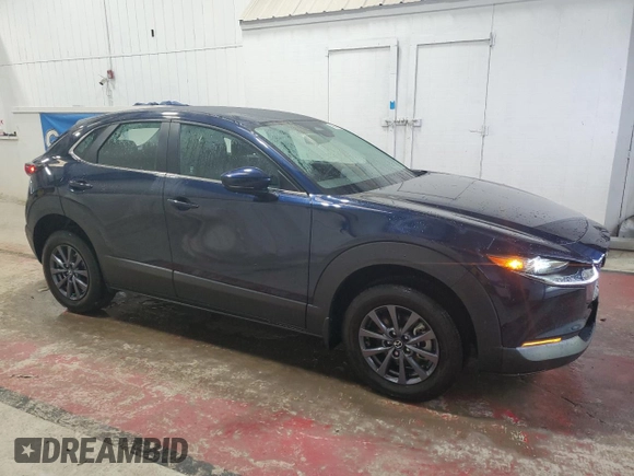 2024 Mazda CX-30 S with VIN 3MVDMBAM1RM694015, listed as a Copart auction lot 46675695 with 4,909 mi miles and Salvage Title. Bid and sale history available at DreamBid. Image 4.