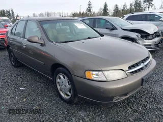1999 Nissan Altima XE with VIN 1N4DL01D1XC210017, listed as a IAAI auction lot 41199544 with 297,917 mi miles. Bid and sale history available at carsss.com. Image 1.