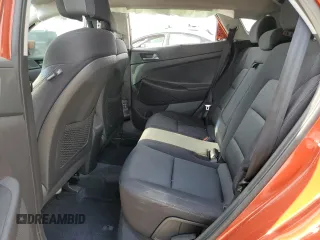 2017 Hyundai Tucson SE z VIN KM8J33A42HU486275, wystawiony jako Copart lot #53658145 z przebiegiem 31 928 mil mil oraz Szkoda całkowita • Salvage title. Historia ofert i sprzedaży dostępna na DreamBid. Obrazek 11.