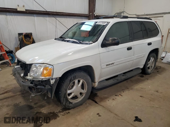 2004 GMC Envoy SLT with VIN 1GKDT13S042257444, listed as a Copart auction lot 89137605 with 301,920 mi miles and Salvage Title. Bid and sale history available at carsss.com. Image 1.