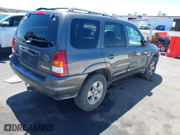 2003 Mazda Tribute ES with VIN 4F2CZ96113KM52877, listed as a IAAI auction lot 42217251 with 218,475 mi miles and . Bid and sale history available at DreamBid. Image 4.