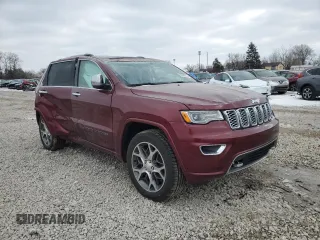 2020 Jeep Grand Cherokee Overland with VIN 1C4RJFCG2LC327390, listed as a Copart auction lot 45600615 with 121,504 mi miles and Salvage Title. Bid and sale history available at carsss.com. Image 4.