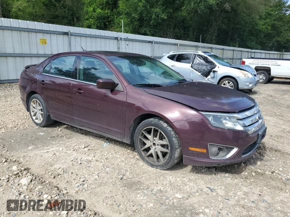 2012 Ford Fusion SEL with VIN 3FAHP0JG3CR411445, listed as a Copart auction lot 60745575 with 209,421 mi miles and Salvage title. Bid and sale history available at DreamBid. Image 4.